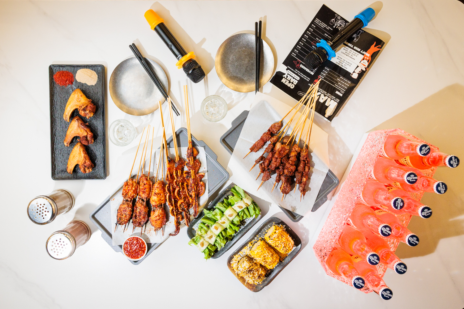 Karaoke spread: skewers, salads, ice-cold drinks